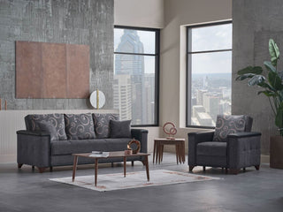 Modern living room with gray sofa and armchair, wooden coffee table, and cityscape view.