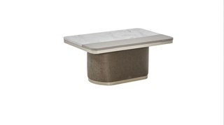 Rectangular table with a textured base and glass top on a white background
