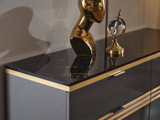 Matching Carlino dresser and framed mirror set with Prada Gray tones and golden detailing.