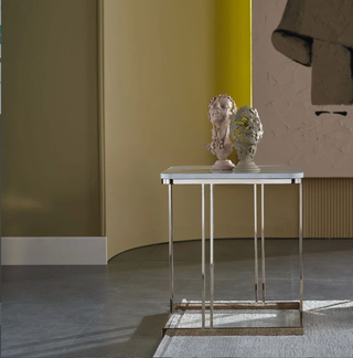 Estella side table with curved wood frame and modern surface.