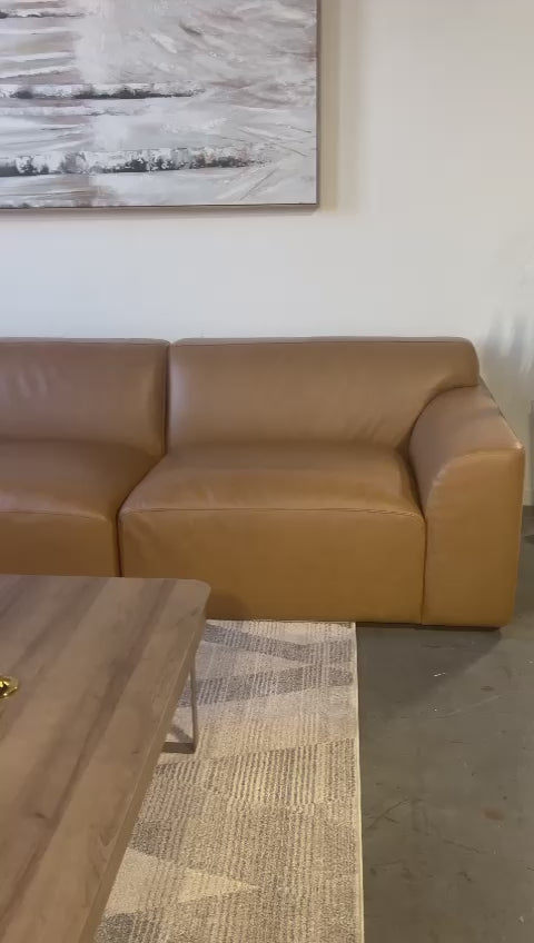 Luxurious Dakota Sectional Sofa made of full-grain leather, offering timeless elegance and comfort