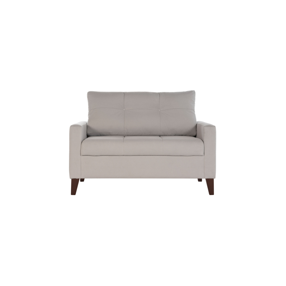 Oversized armchair with top-to-bottom button tufting and clean lines.