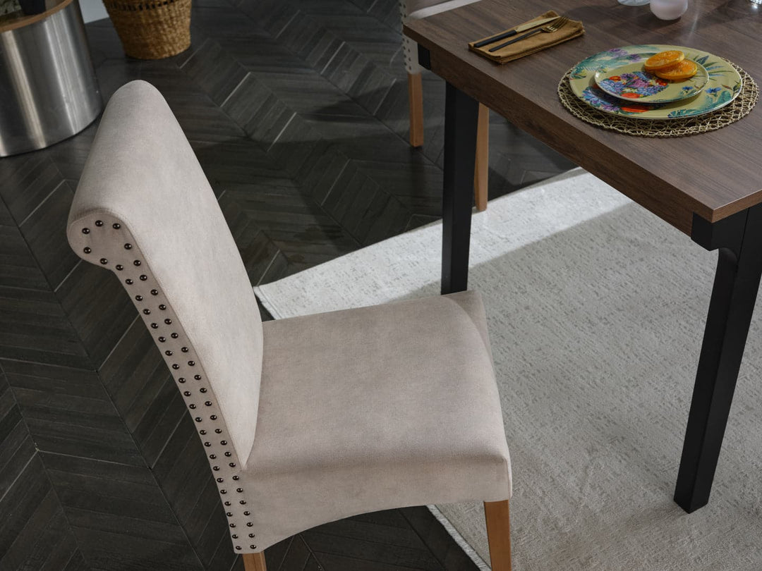 Versatile Margo Chair: Perfect for casual to swanky gatherings with a tall rolled back